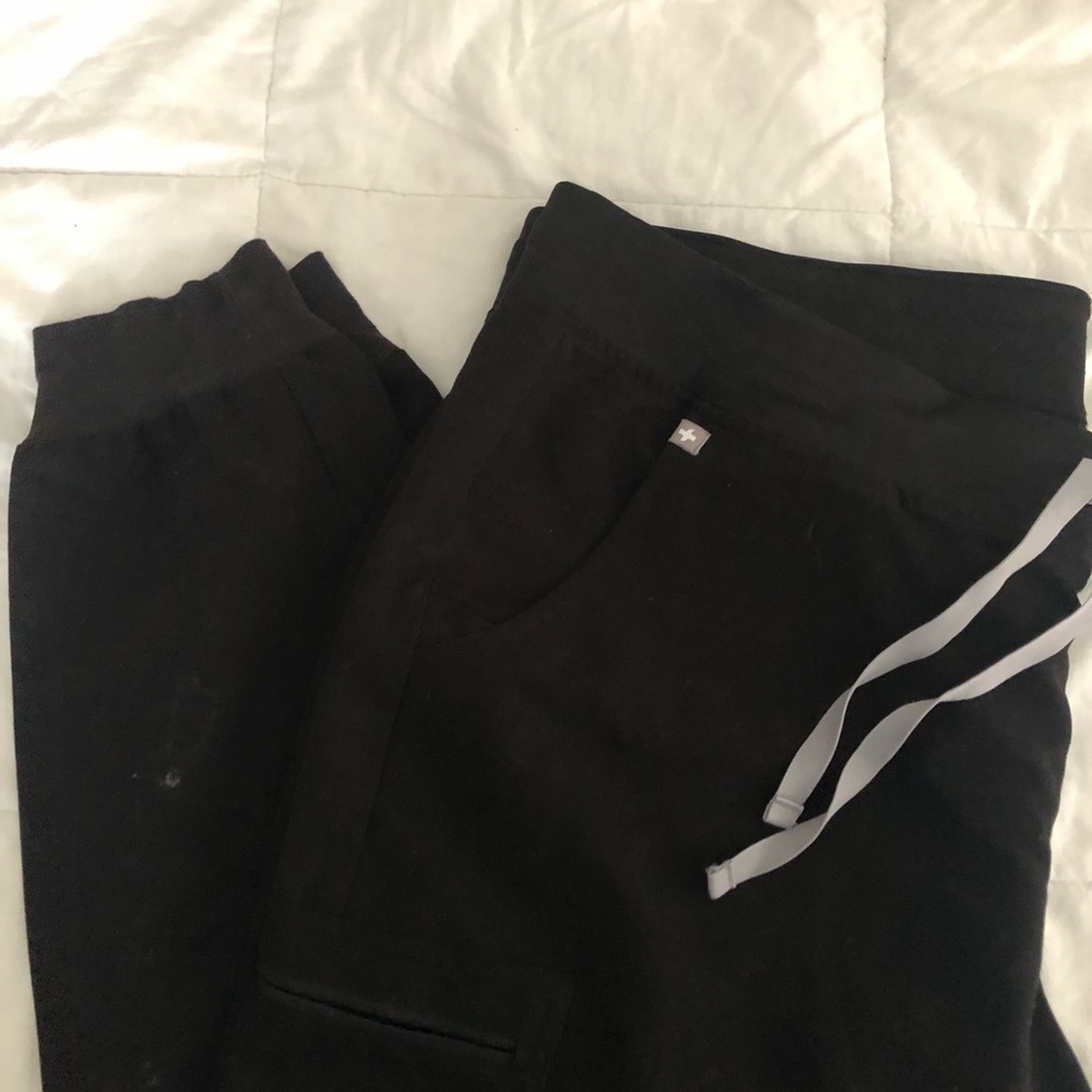 FIGS Women’s Zamora jogger scrub pant in black.
